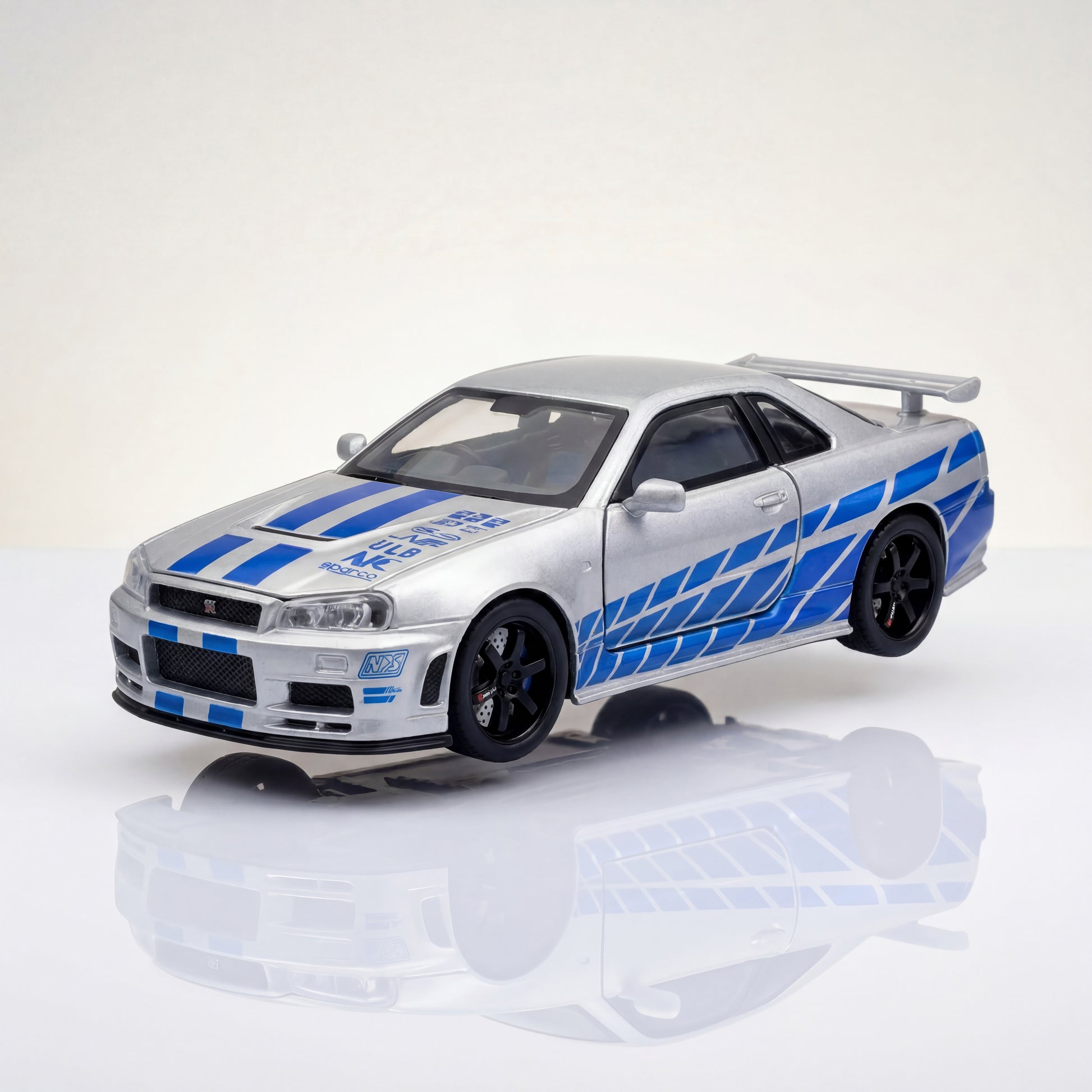 Nissan GTR R34 1 36 scale diecast model car with opening doors and JDM styling