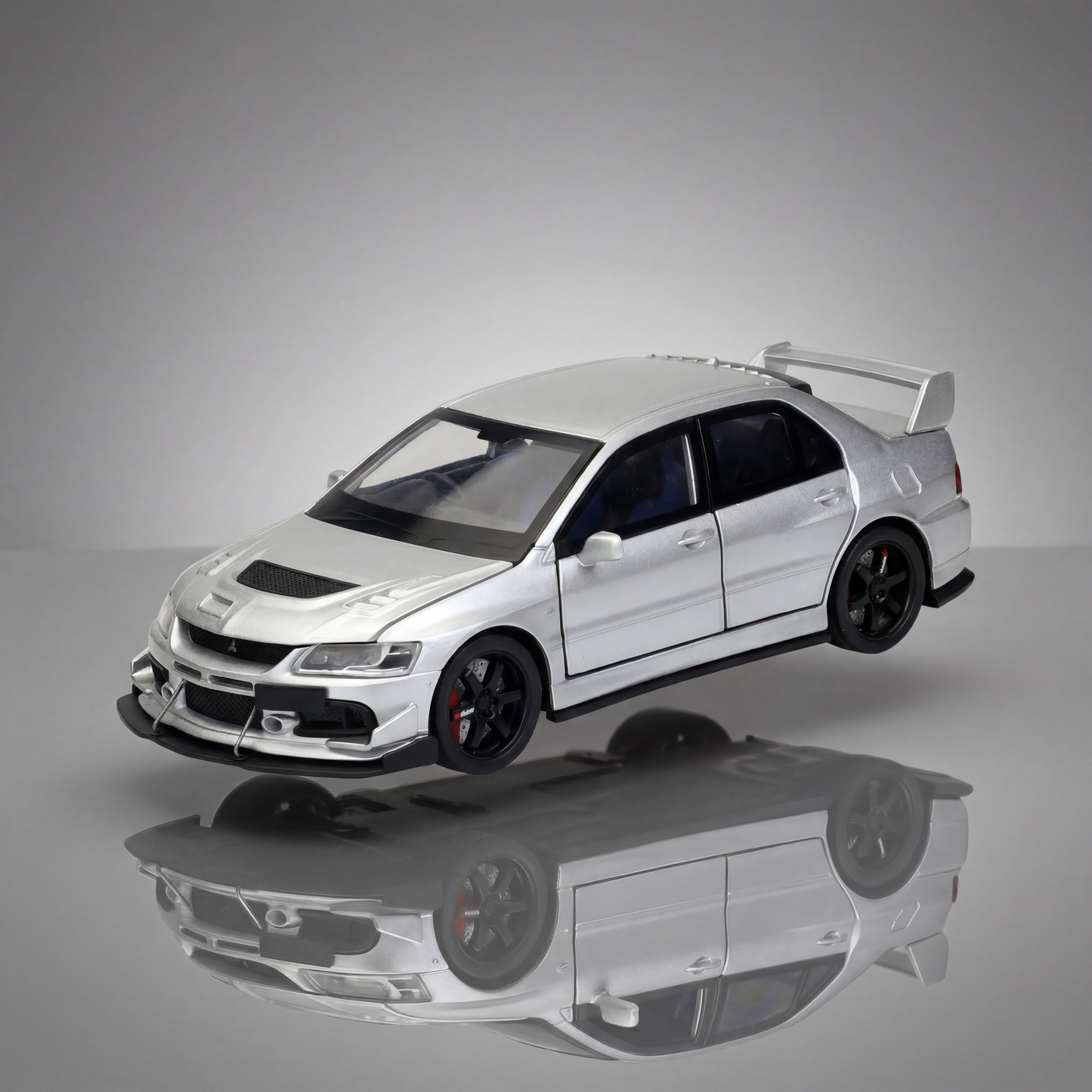 Mitsubishi Lancer EVO 1 36 scale diecast model car in rally sport finish