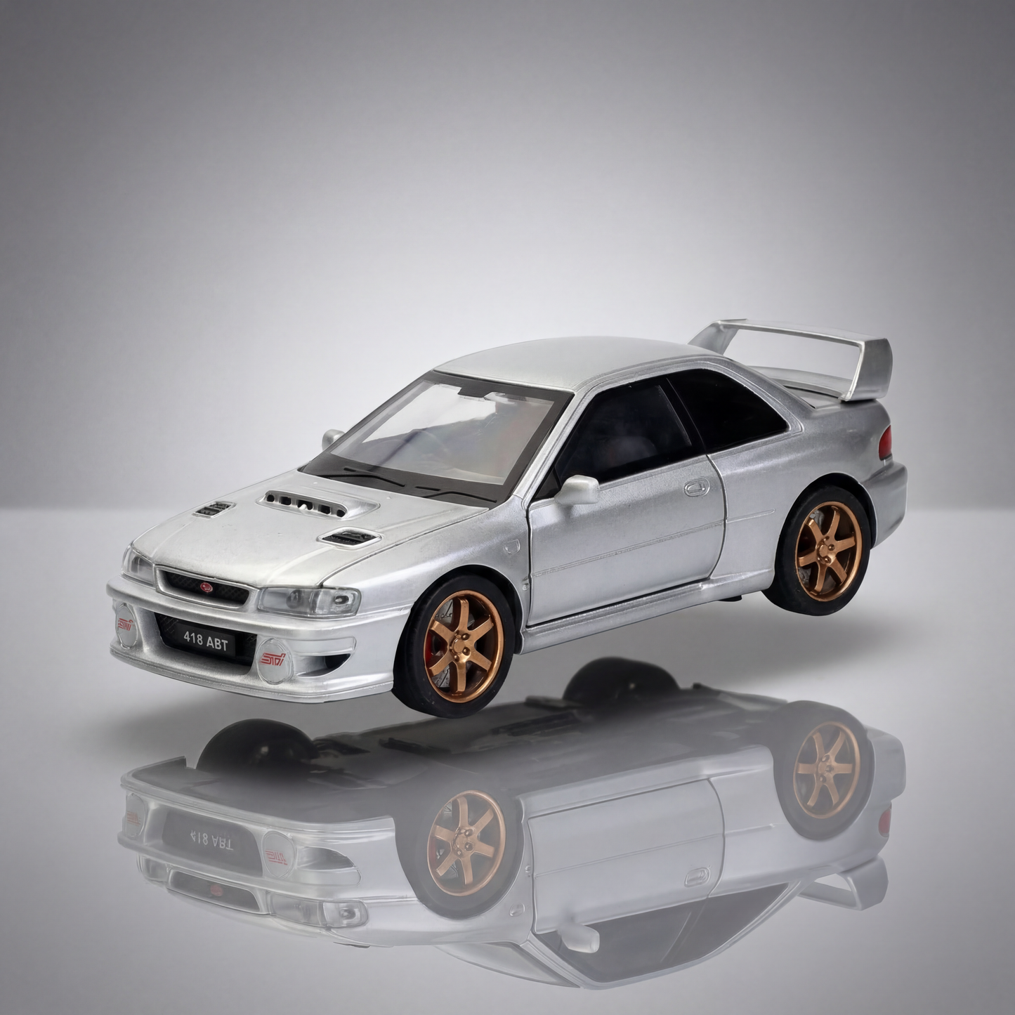 Subaru Impreza 1 36 scale diecast rally model with gold wheels and blue finish