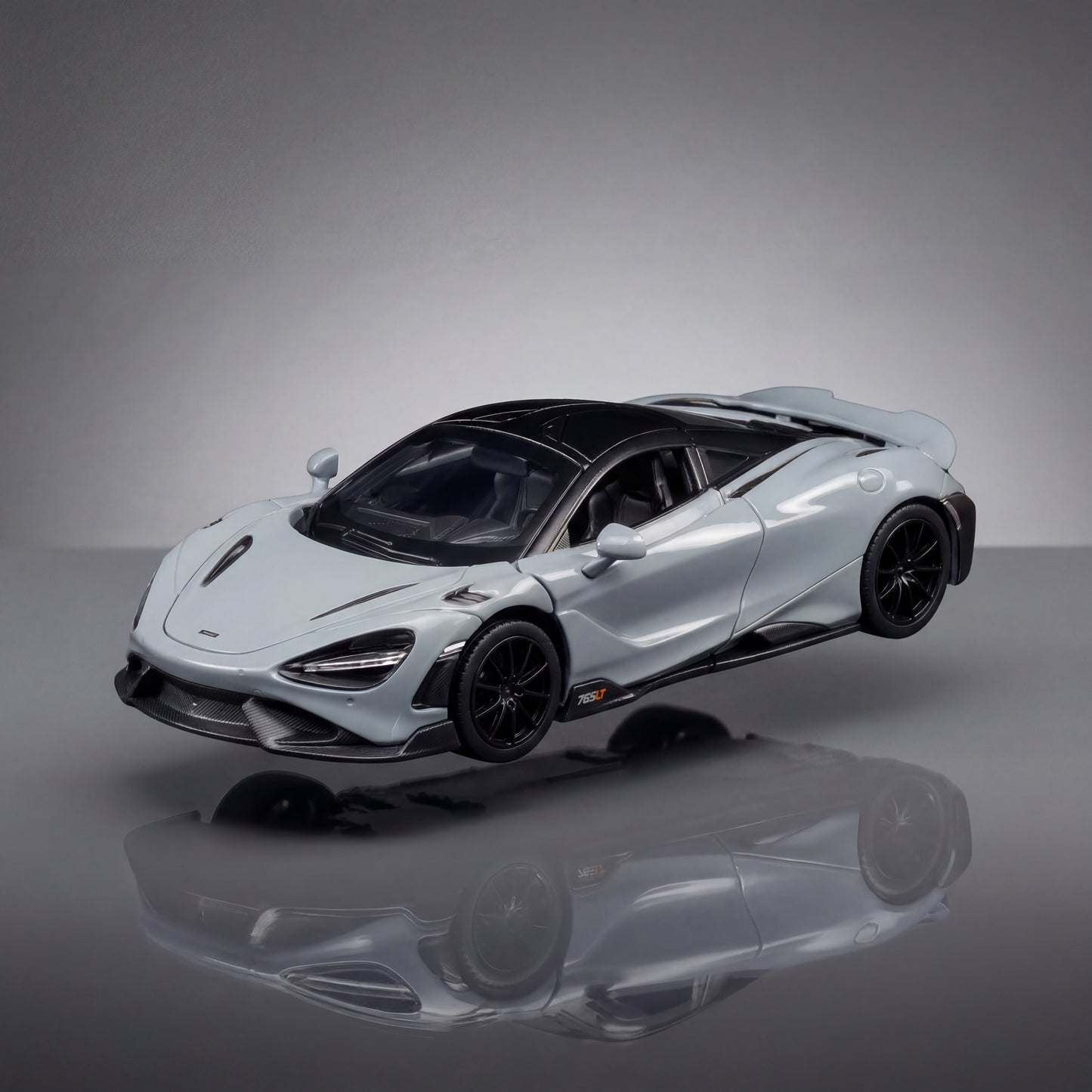 McLaren 765LT 1 36 scale diecast model with opening dihedral doors and orange finish
